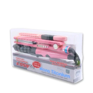 Plancha para cabello Nano Titanium color rosa, con placas de 1 1/4 pulgadas, empaquetada en caja transparente con información de temperatura de 450 grados.