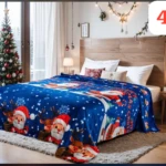 Cobija navideña azul con Santa Claus y renos, ideal para cama.