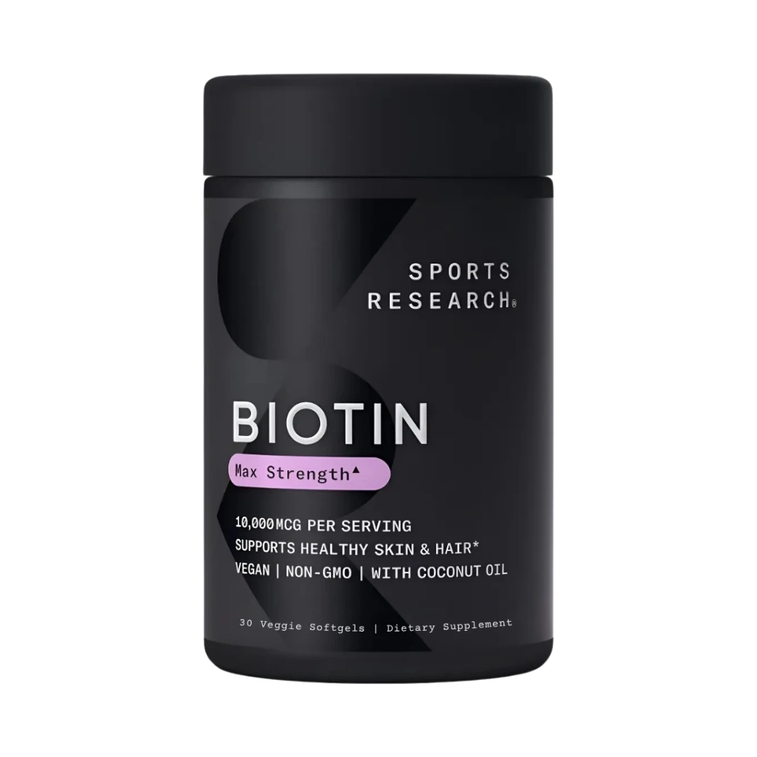 Bote negro de suplemento Biotin Max Strength Sports Research con 10,000 mcg, vegano y con aceite de coco.