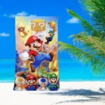 Toalla de playa infantil con diseño de Mario Bros, Luigi y Toad, ideal para el verano.