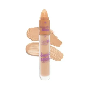 Corrector de ojeras doble Super Cool en tono piel, con acabado mate y aplicador en brocha.