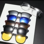 Gafas 5 en 1 magnéticas polarizadas. Montura negra con 4 lentes intercambiables: azul, café, gris y amarillas.
