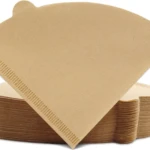 Filtros para cafetera V60 cónicos #1, color marrón, textura papel, apilados.