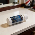 Botella de Minoxidil Kirkland 5% extra fuerza para hombres, solución tópica para crecimiento capilar.
