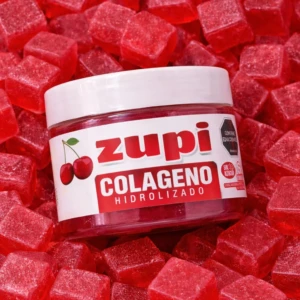 Gomas de colágeno hidrolizado Zupi en frasco, rodeadas de gomitas rojas tipo cubo.