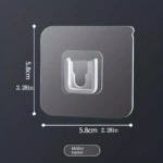 Gancho adhesivo transparente cuadrado de 5.8cm x 2.28in, tipo hebilla, para colgar objetos.