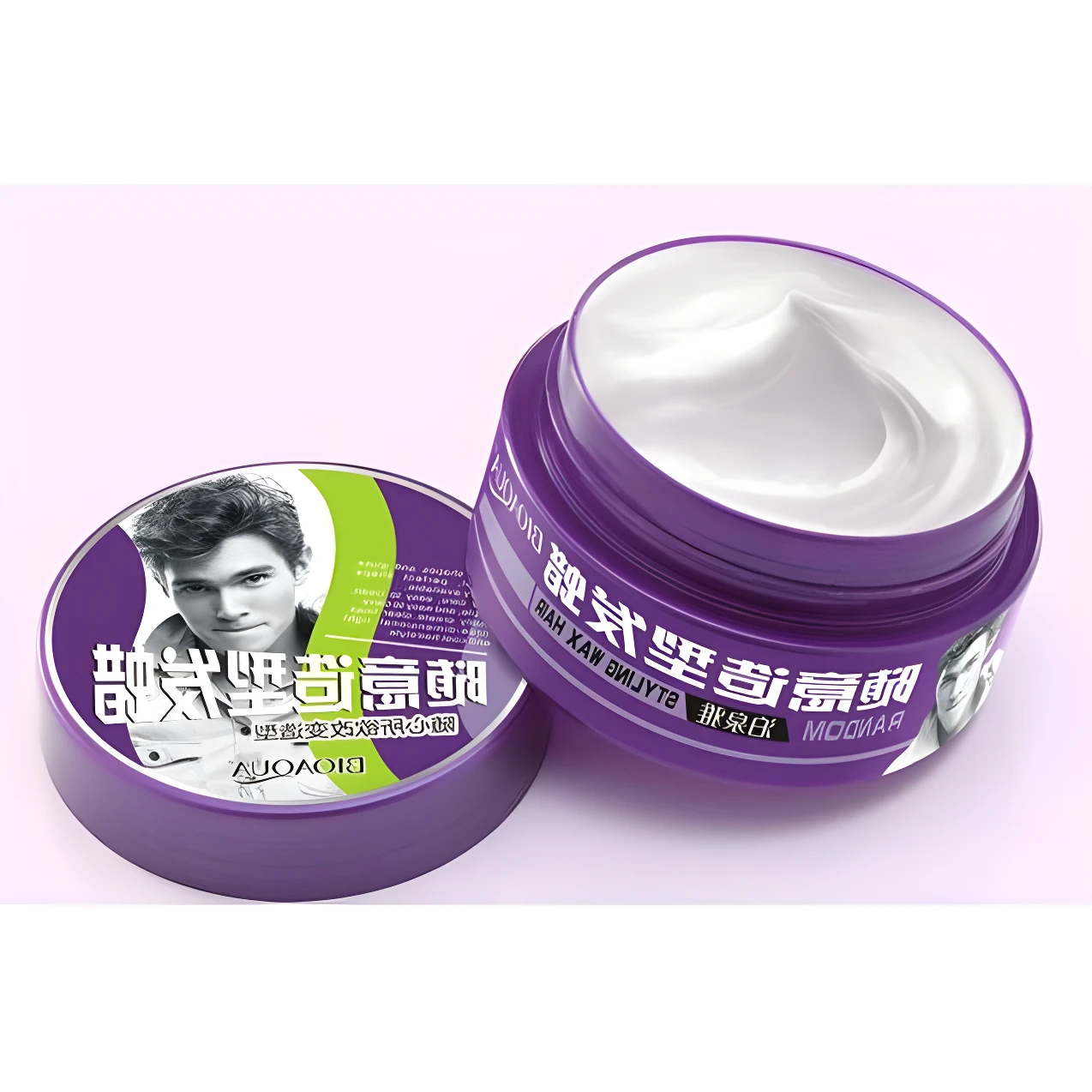 Set de cera capilar para hombre en envase morado con tapa abierta mostrando textura cremosa blanca y diseño con rostro masculino sobre fondo rosado.