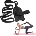 Banda de estiramiento negra para piernas y dispositivo de sujeción de pie para ejercicios de flexibilidad.