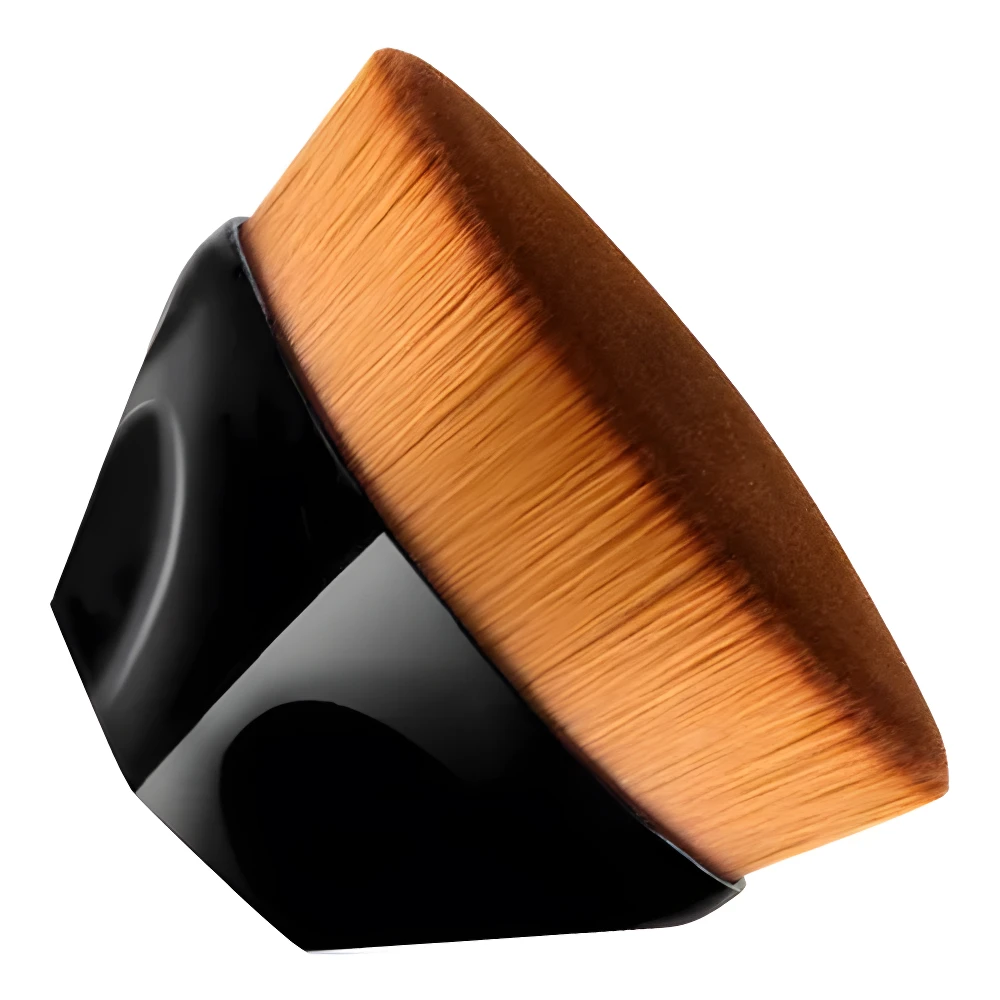 Brocha mágica para maquillaje, cerdas naranjas densas, mango negro brillante, para aplicar y difuminar base con acabado profesional.