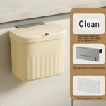 Canasta de basura colgante beige con tapa hermética, ideal para cocina, se cuelga en gabinete o pared.