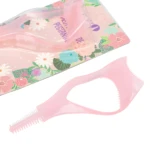 Set x2 cepillo facial rosa 5 en 1 con protector de pestañas en empaque floral.