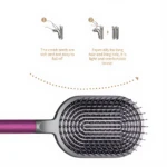 Cepillo desenredante profesional con mango morado, cabezal ovalado de púas flexibles y diseño ergonómico. Incluye diagramas sobre su uso en cabello largo.