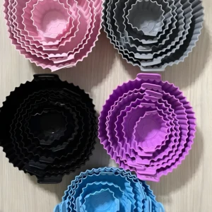 Moldes de silicona para donas: 6 unidades en colores rosa, gris, negro, morado y azul, con diseño acanalado.