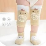 Medias y rodilleras antideslizantes para bebé con diseño de pollito.