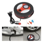 Compresor de aire portátil para llantas, circular negro y rojo, con manómetro y cable encendedor. Incluye adaptadores.