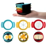 Set x2 cortador de huevos 3 en 1: azul (rebanadas), amarillo (gajos), rojo (lonjas). Incluye huevera.