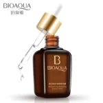 Frasco ámbar de esencia facial BIOAQUA con gotero dorado, líquido transparente y texto en chino e inglés.