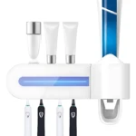 Esterilizador Zoosen UV con dispensador de pasta, 4 cepillos eléctricos (2 blancos, 2 negros) y 2 tubos pequeños.
