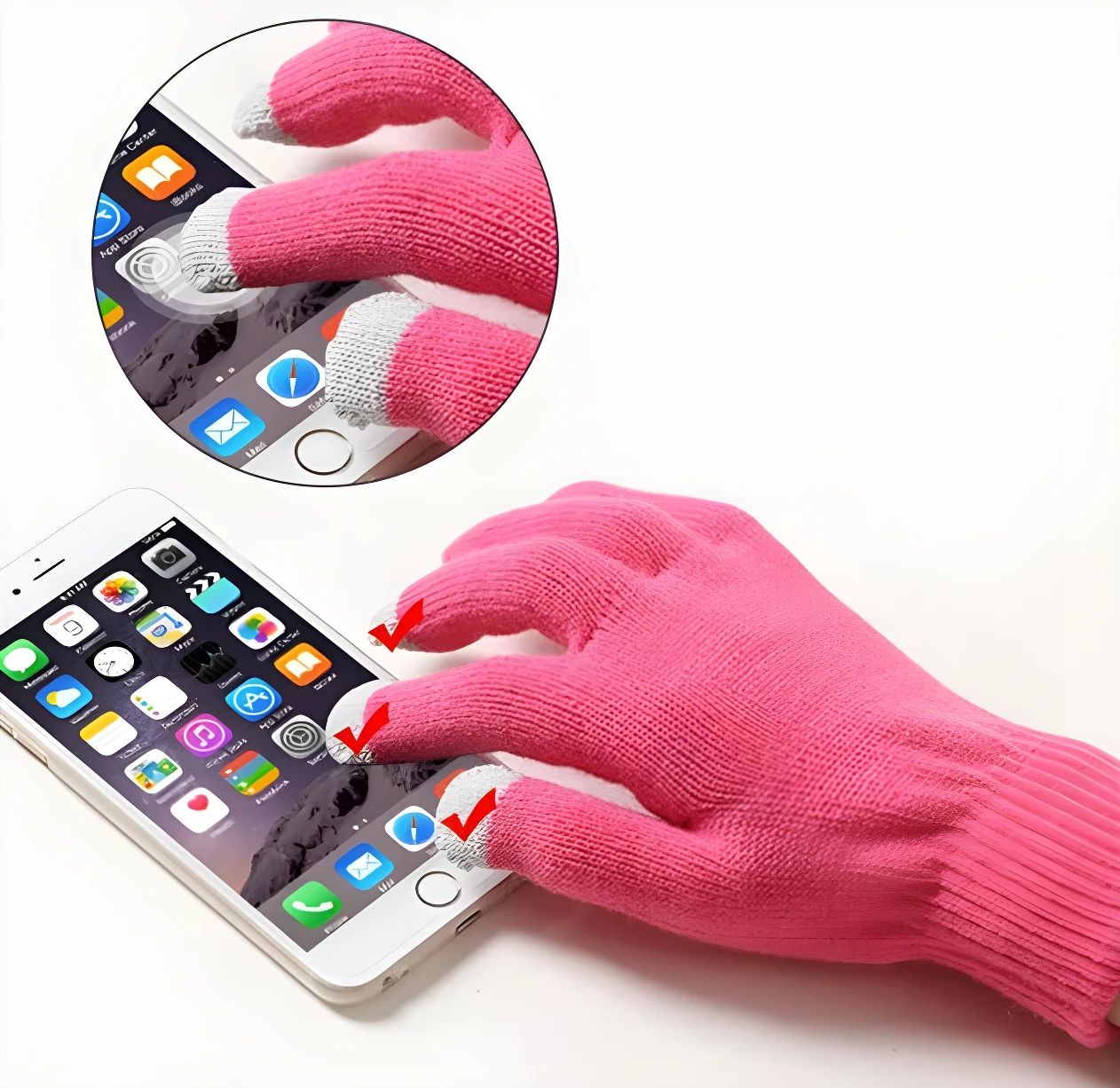 Guantes rosados de tela para pantalla táctil de celular, detalle de dedos con punta gris.