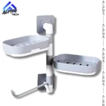 Jabonera de pared gris y blanca de 2 niveles giratoria con gancho, ideal para organizar baño o cocina.