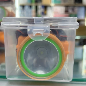 Linterna LED 60W Pj-125 en estuche plástico transparente, reflector naranja y verde, 150 caracteres.