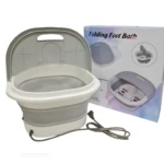 Bañera plegable blanca y gris para pies con masajeador eléctrico y tapa, junto a su caja.