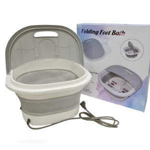 Bañera plegable blanca y gris para pies con masajeador eléctrico y tapa, junto a su caja.