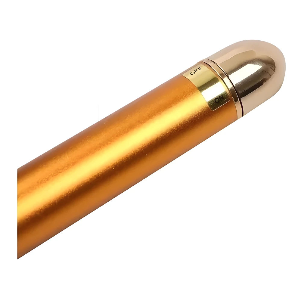 Masajeador facial dorado con rodillo para la piel, interruptor de ON/OFF visible.