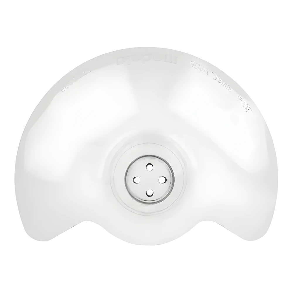 Pezonera transparente Medela 20mm, fabricada en Suiza, con 4 orificios para lactancia.