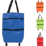 Carro bolsa azul con ruedas y asas negras, set x2 con bolsas naranja, verde y roja.