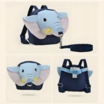 Mochila arnés de seguridad infantil azul con diseño de elefante, incluye correa extraíble.