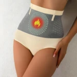Panty faja control abdomen beige, con diseño térmico frontal y banda de ajuste.