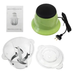Picador eléctrico verde y transparente con cuchillas, tapa y manual de instrucciones.