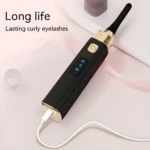 Rizador eléctrico de pestañas negro y dorado con pantalla LED de temperatura (65-85°C) y cable USB.