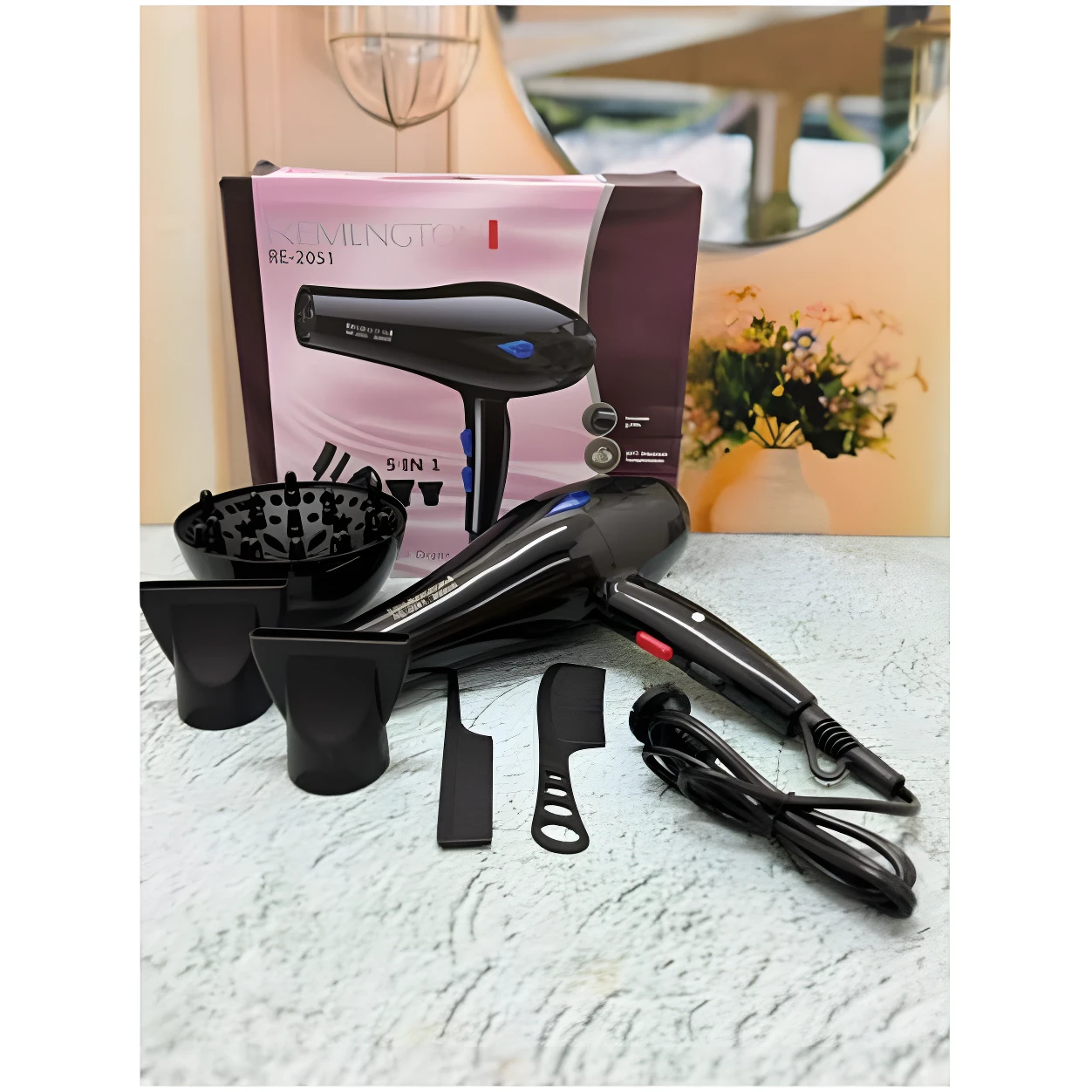 Secador profesional Redenton negro con difusor, dos boquillas concentradoras, dos peines accesorios, cable de alimentación y caja de empaque exhibidos.