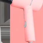 Secadora portátil rosa marca Rongfu, modelo MLS-3318, con boquilla negra y control plateado.