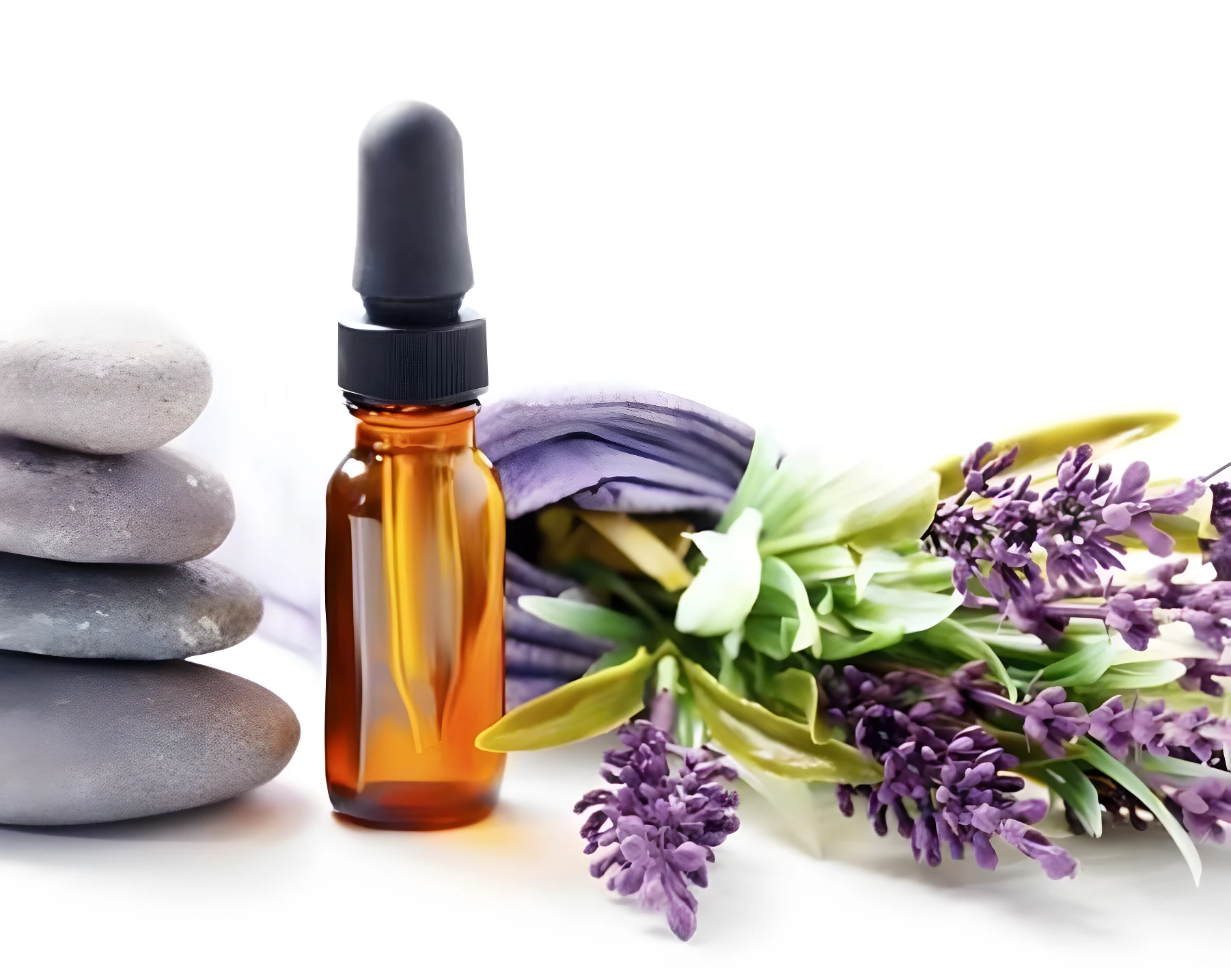 Frasco de vidrio ámbar con gotero junto a piedras zen apiladas y flores de lavanda, ideal para exhibir set de suero capilar anti-piojos.