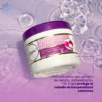 Terapia Capilar de Crecimiento Anyeluz en envase blanco y morado con extracto de cebolla roja, protege el cabello de temperaturas extremas.