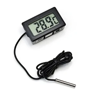 Termómetro digital con cable y sensor metálico, muestra 28.9°C.