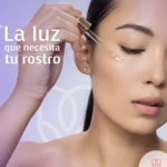 Gotero de suero aclarante facial aplicándose en mejilla de mujer, con texto "La luz que necesita tu rostro".