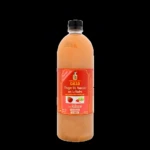 Botella de vinagre de manzana GALO con "La Madre" y rábano, color ámbar.