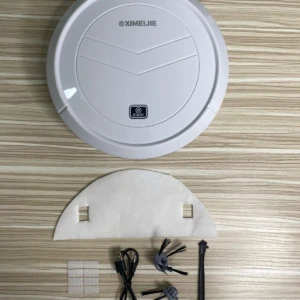 Robot aspirador recargable blanco XIMELJIE con accesorios incluidos: cable de carga, cepillos, filtros y adhesivos, dispuestos sobre superficie de madera clara.