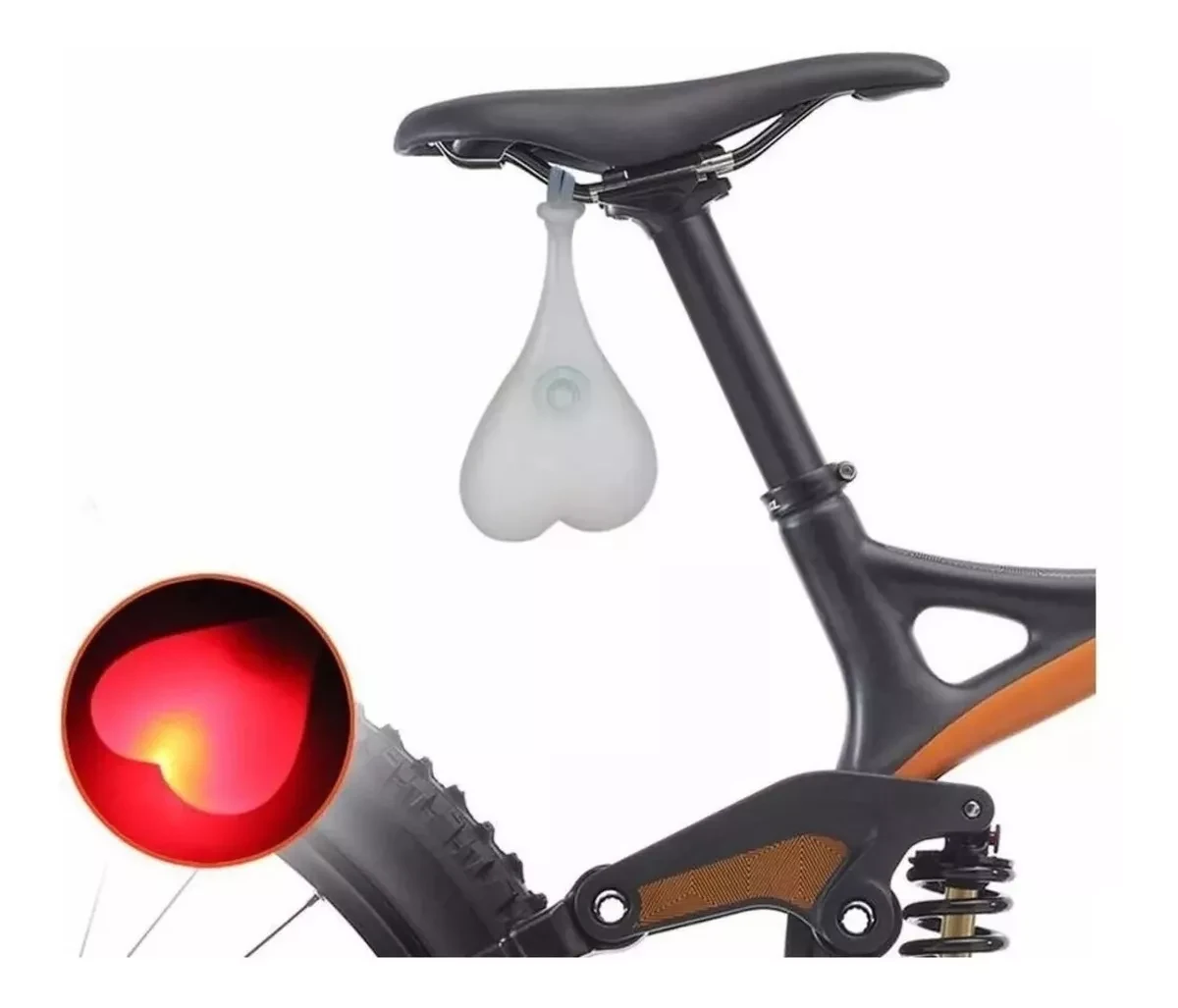 Luz LED trasera para bicicleta en forma de corazón, blanca, colgando del sillín.