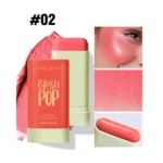 Rubor en barra HANDAIYAN #02 Blush Pop, lip & cheek, 19g, aplicado en mejilla y muestra textura coral.