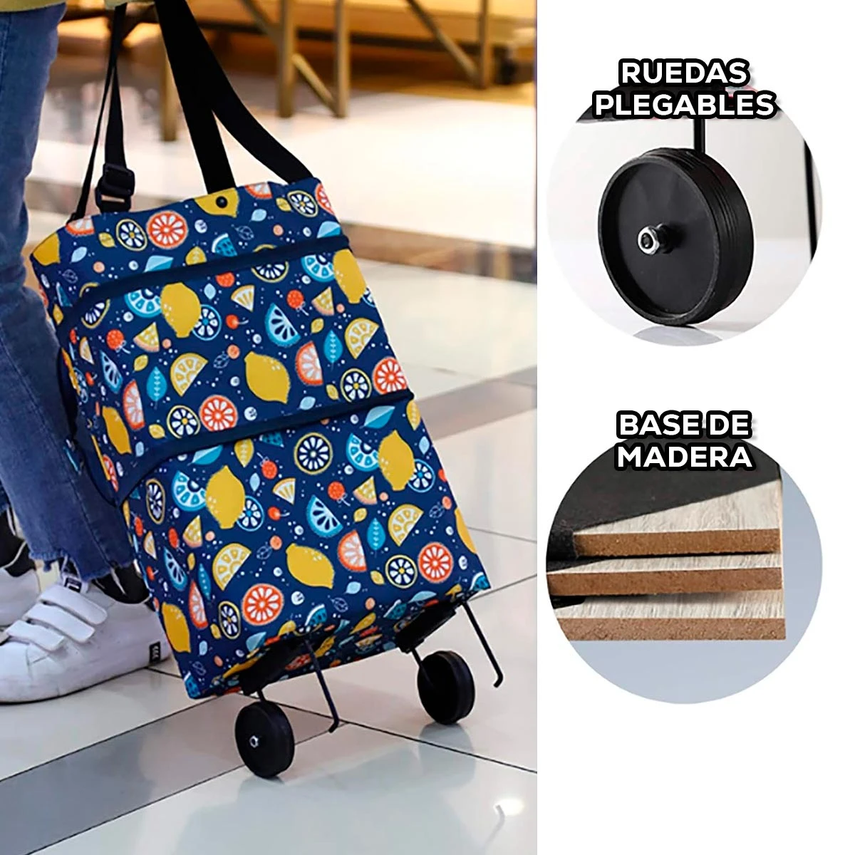 Bolso de compras plegable con ruedas, diseño floral en azul sobre tela Oxford. Muestra detalles de las ruedas negras y base de madera.