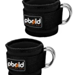 Tobilleras negras acolchadas con argollas metálicas para ejercicios de tonificación y fortalecimiento.
