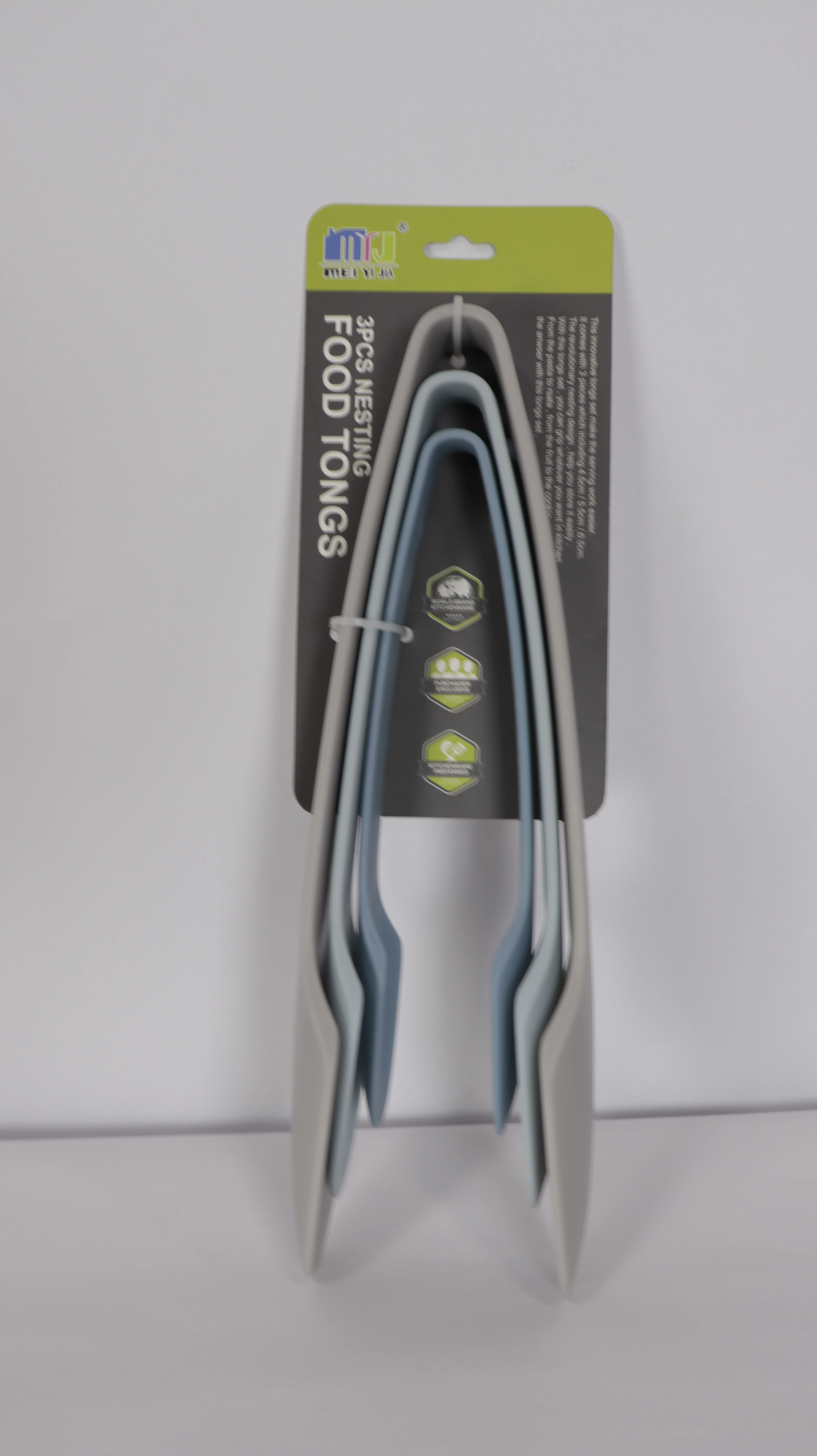 Pinzas de cocina silicona en empaque con cuatro unidades, colores gris y azul, diseño ergonómico para manejo de alimentos.