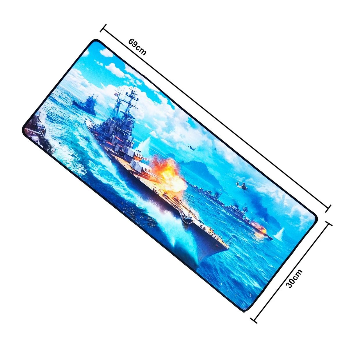Mousepad gamer XL de 69x30 cm con diseño de batalla naval. Muestra un buque de guerra disparando en mar azul con fuego naranja.