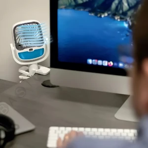 Difusor de aire portátil Arctic Air Grip Go blanco y azul con pinza, ideal para escritorio.