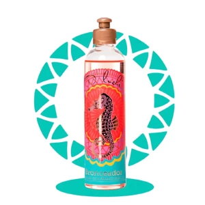 Aceite bronceador D'Luchi con seahorse en envase transparente, tapa dorada, fondo circular turquesa.